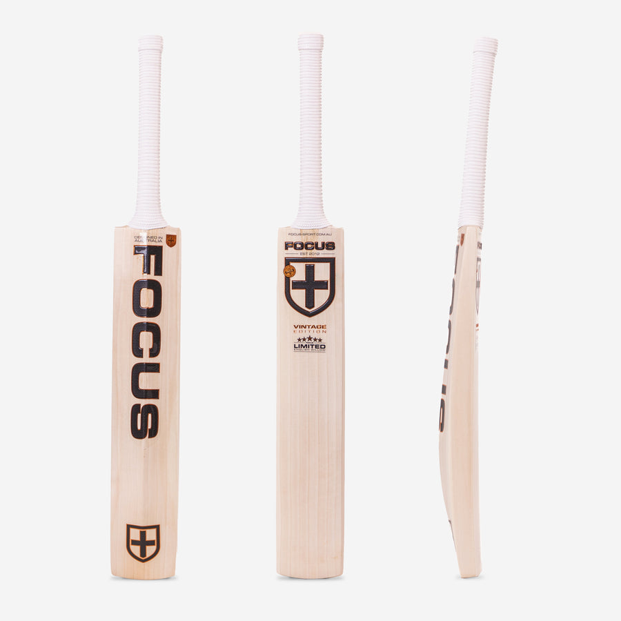 A premium-grade cricket bat from Focus, displayed from three different angles – front, back, and side view. The bat features a light-colored willow blade with a sleek design, bold focus cricket branding